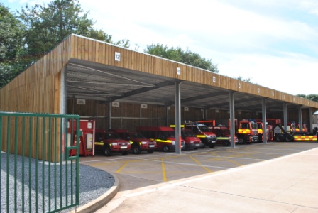 Fire response vehicles in garage
